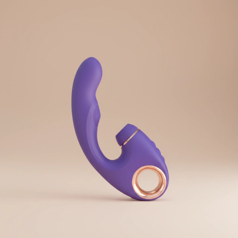 Purple and rose gold electronic device on a beige background