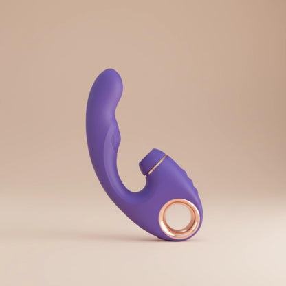 Purple and rose gold electronic device on a beige background