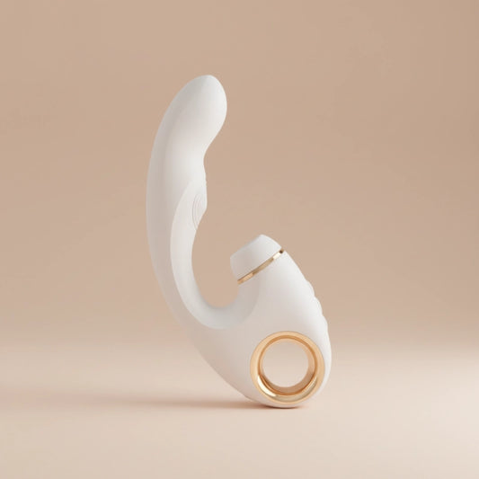 White and gold decorative item on a beige background