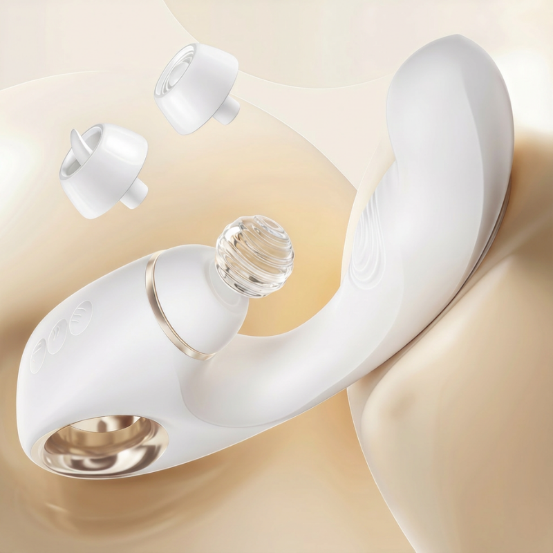 Close-up of the interchangeable suction heads for the white massager, showing options for different sensations.