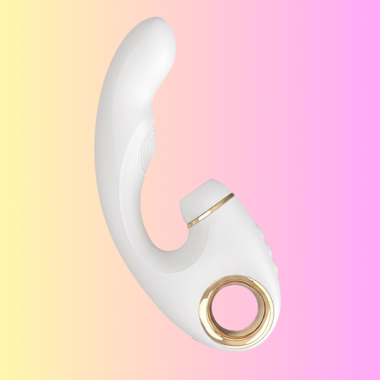 The sleek, white  personal massager with its three core attachments for licking, suction, and vibration