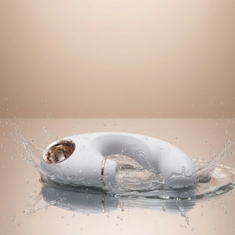 White electronic device with water splashes on a beige background