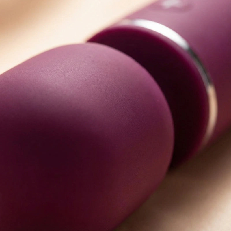 Close-up of the ultra-soft silicone massage head demonstrating its flexible, skin-like texture.