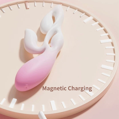 Pink and white device with 'Magnetic Charging' text on a circular beige background