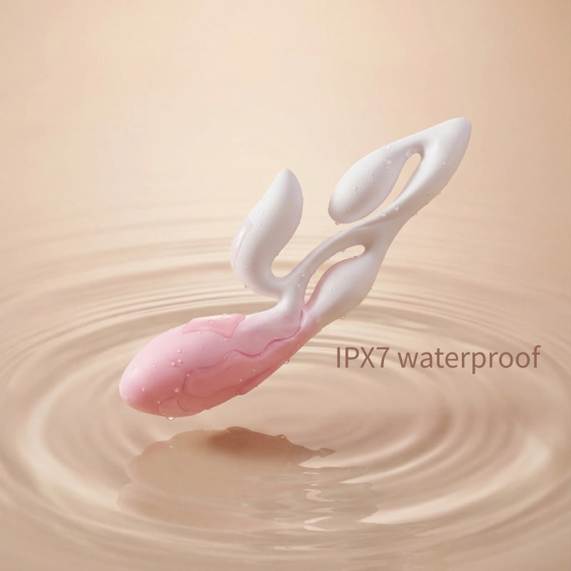 Pink-white wellness device displayed with water droplets and reflective violet water surface, representing IPX7 waterproof capability.
