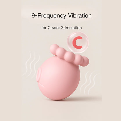 Pink octopus vibrator resting on a soft jelly pad with visible ripples showing high-frequency vibration, personal massager designed for female sexual wellness.
