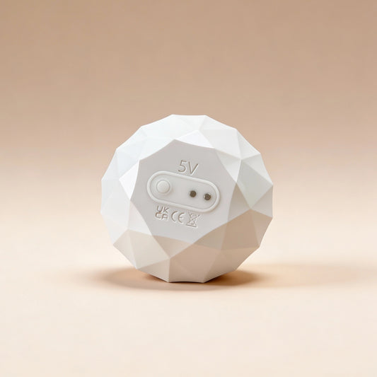 Geometric white device with '5V' and certification logos on a beige background