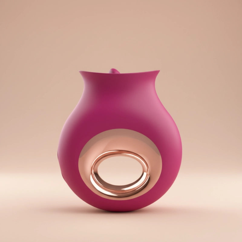 closed up burgundy gold product on a beige background