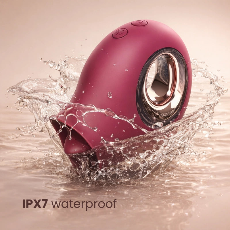 Pink waterproof electronic device with water splashes on a beige background
