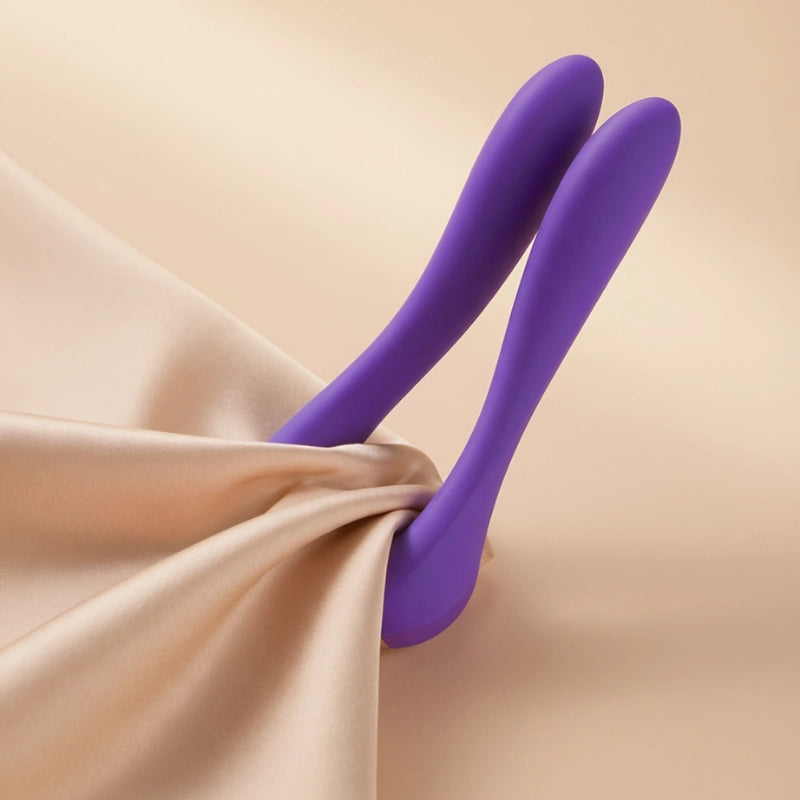 Close-up visual of two flexible arms gently closing together, symbolizing a soft fingertip-like pinch with a glowing abstract element.