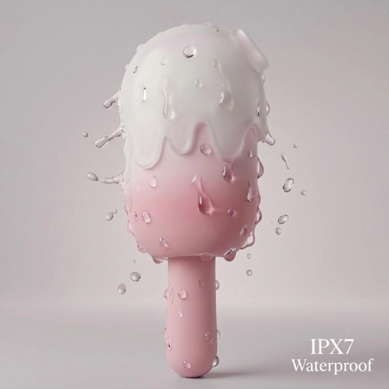 Close-up of the pink ice cream toy with water droplets glistening on its surface, demonstrating its IPX7 waterproof rating for easy cleaning and versatile use in the bath or shower.