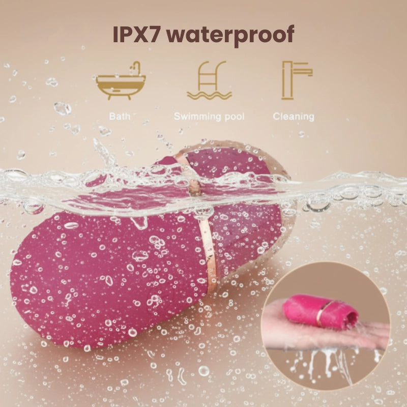 The IPX7 waterproof lipstick tongue licker on a wet surface, safe for use in the bath, swimming pool, and for effortless cleaning under running water.
