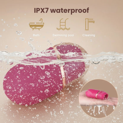 The IPX7 waterproof lipstick tongue licker on a wet surface, safe for use in the bath, swimming pool, and for effortless cleaning under running water.
