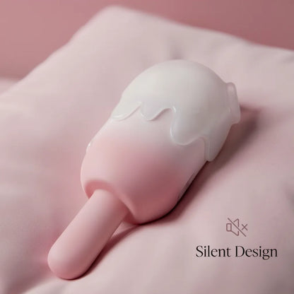 Side view of the pink ombre ice cream toy resting on a soft pillow, showcasing its silent design for private and undisturbed moments in the bedroom.