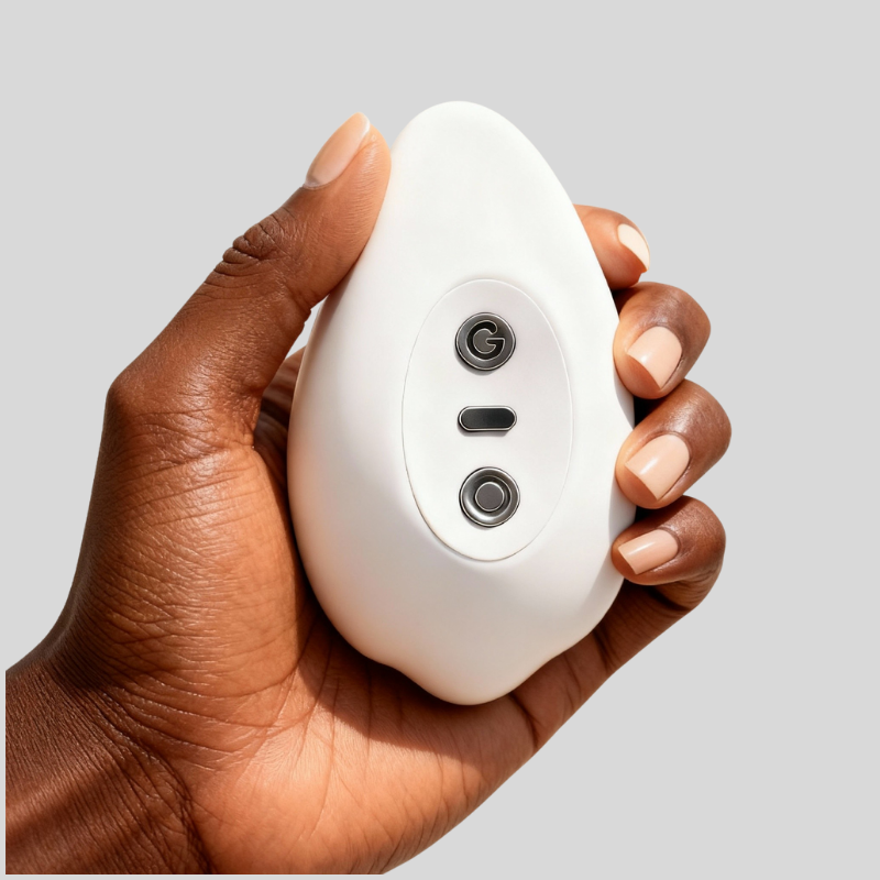 Close-up of the swan massager's base, showing intuitive one-touch buttons for vibration, suction, and an instant-stop button.